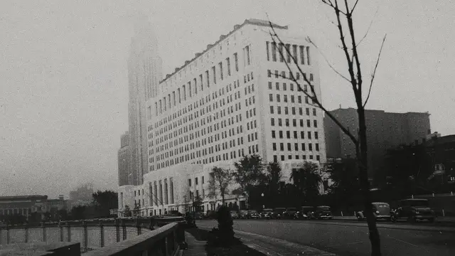 An office block half lost in fog